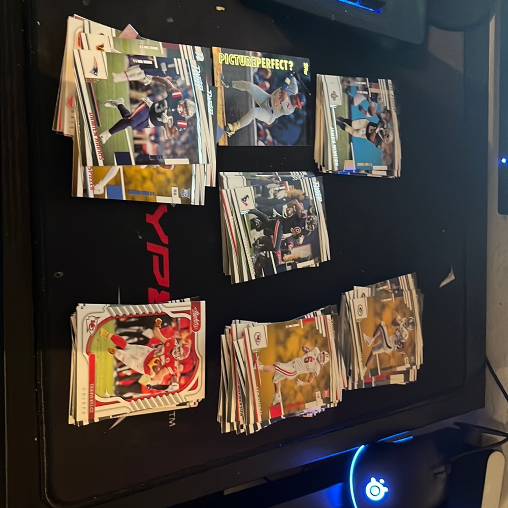 1 baseball card and 40+ football cards